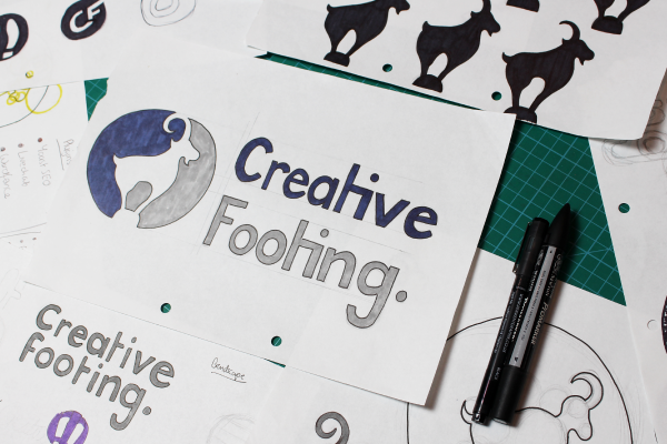 Sketches of the Creative Footing logo, illustrating the designer’s journey in building his personal brand and freelance graphic design business.